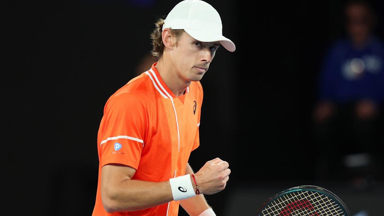 MELBOURNE, AUSTRALIA - JANUARY 17: Alex de Minaur of Australia celebrates a point in their round two singles match against Matteo Arnaldi of Italy during the 2024 Australian Open at Melbourne Park on January 17, 2024 in Melbourne, Australia. (Photo by Daniel Pockett/Getty Images)