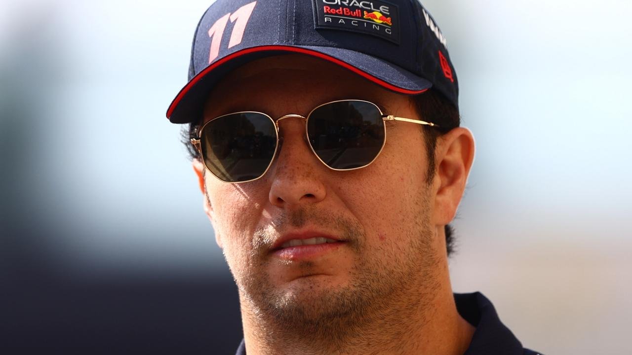 ABU DHABI, UNITED ARAB EMIRATES - NOVEMBER 25: Sergio Perez of Mexico and Oracle Red Bull Racing walks in the Paddock prior to practice ahead of the F1 Grand Prix of Abu Dhabi at Yas Marina Circuit on November 25, 2023 in Abu Dhabi, United Arab Emirates. (Photo by Clive Rose/Getty Images)